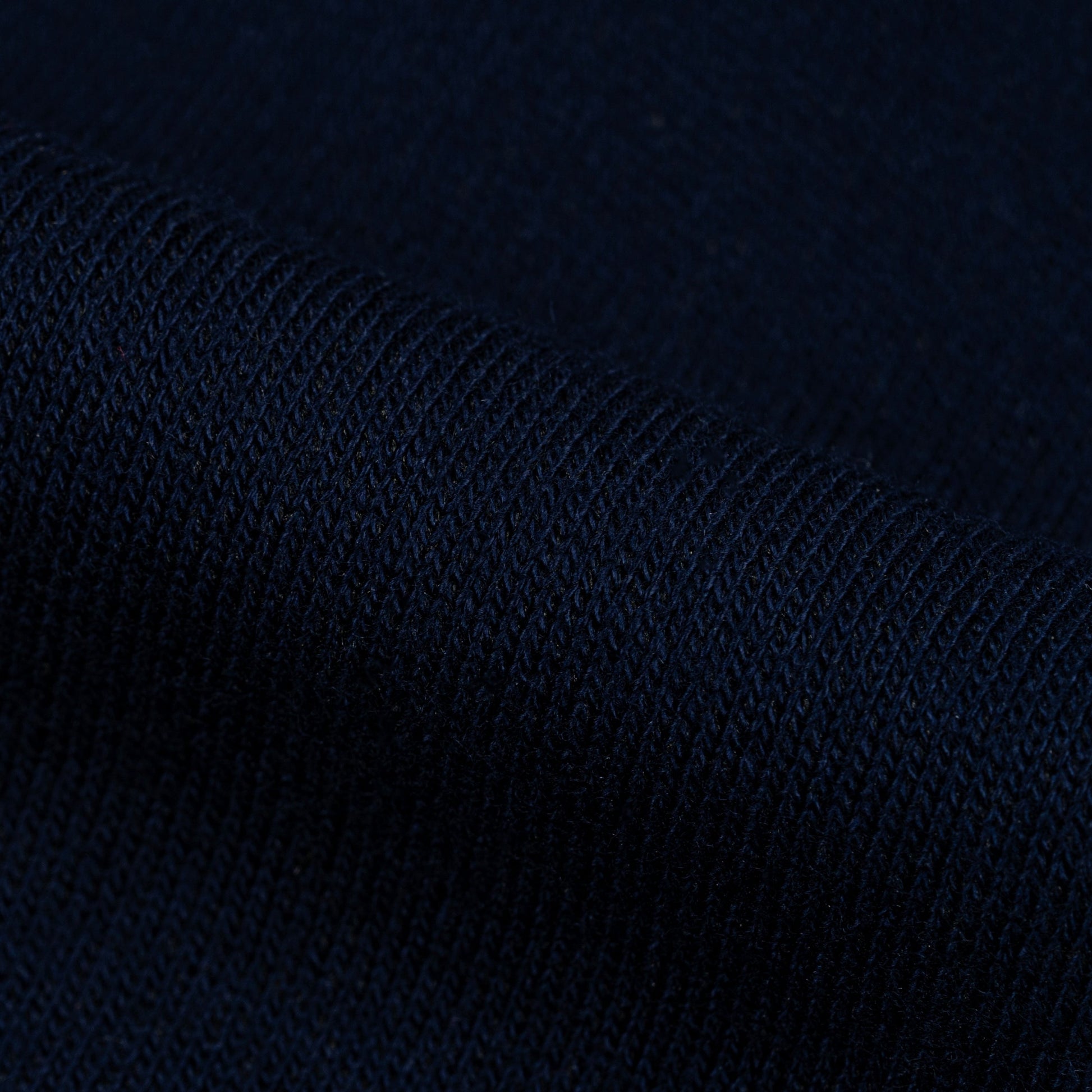 Dark blue textured fabric pattern