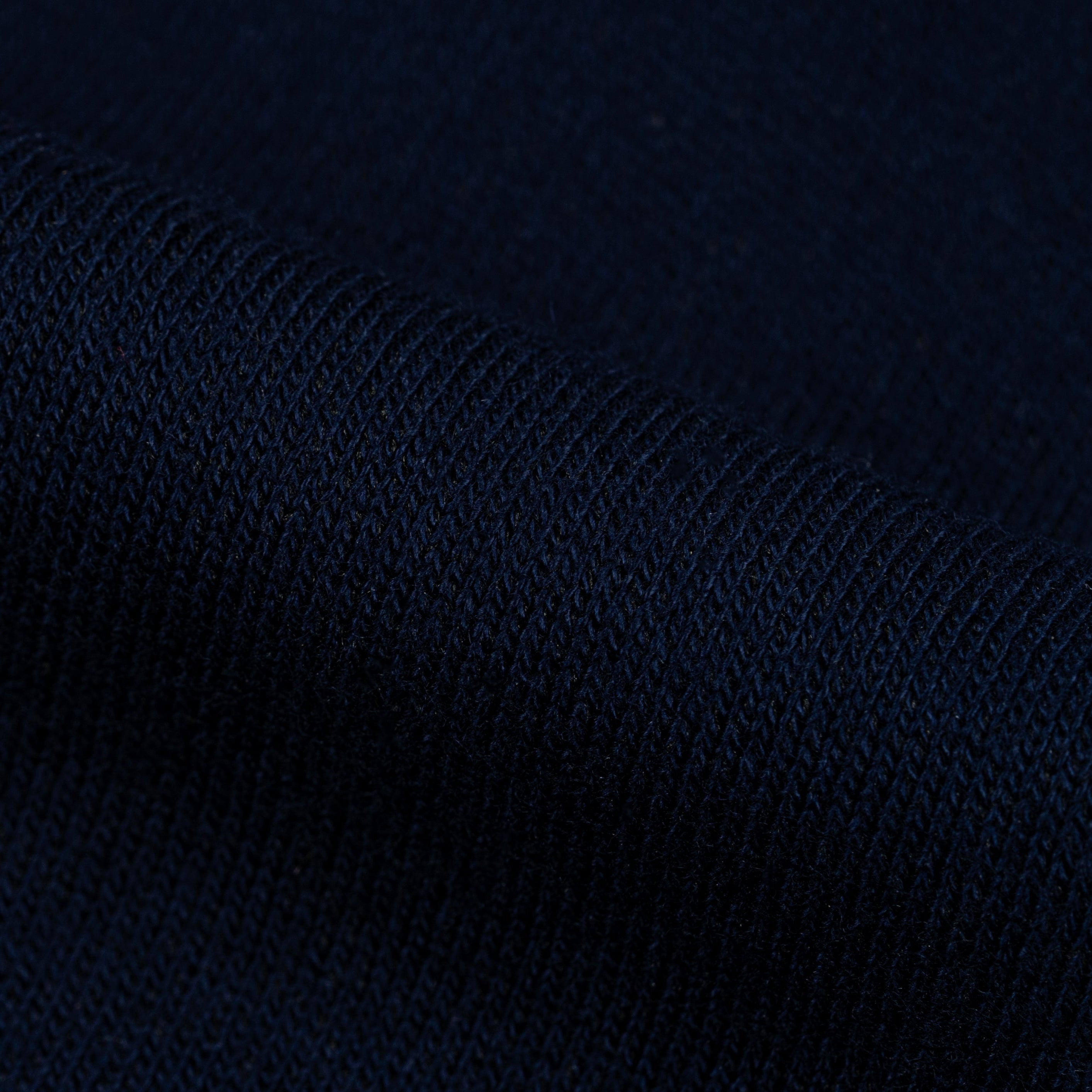 Dark blue textured fabric pattern